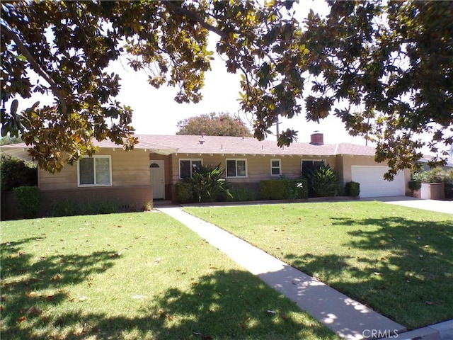 4066 Tenango Rd, Claremont, CA 91711 - single story home with a chimney, concrete driveway, and a front yard