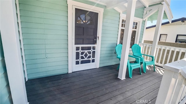 wooden deck featuring a porch