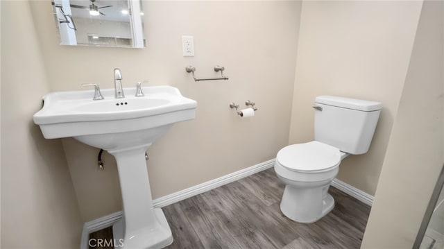 bathroom featuring toilet and hardwood / wood-style flooring