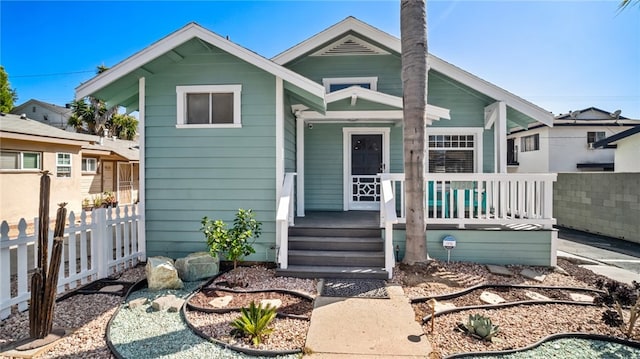 bungalow featuring covered porch