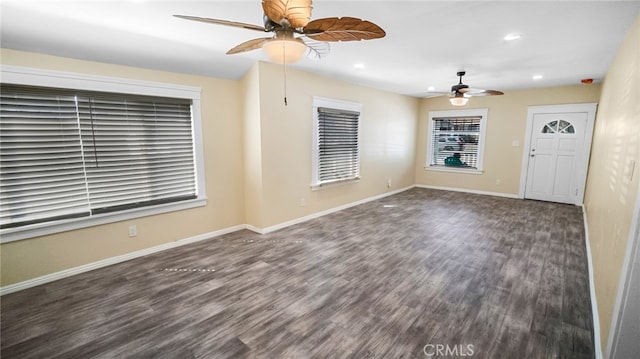 foyer featuring dark hardwood / wood-style floors and ceiling fan