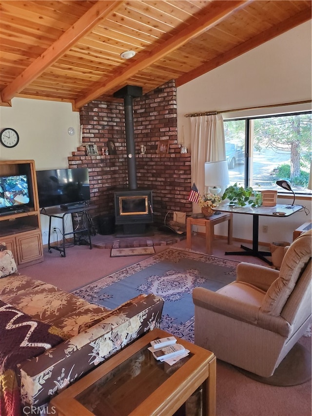 carpeted living room with vaulted ceiling with beams, a wood stove, and wooden ceiling