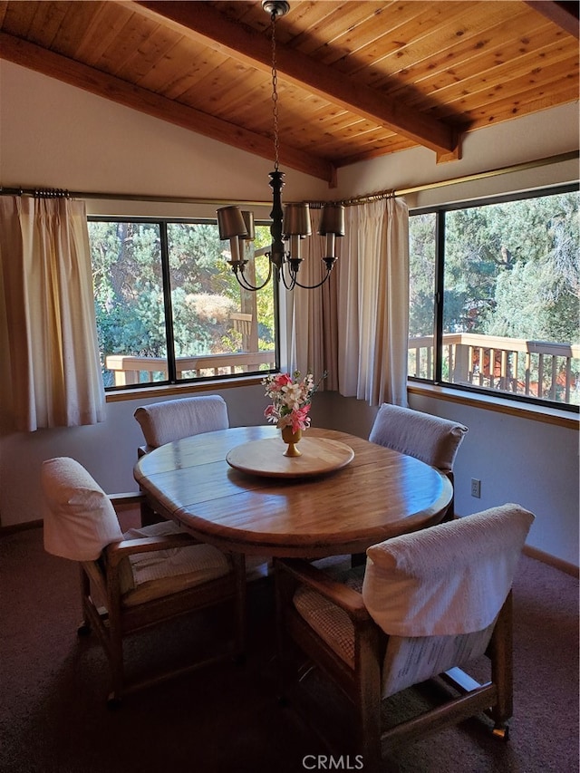 carpeted dining area with a notable chandelier, a wealth of natural light, lofted ceiling with beams, and wood ceiling