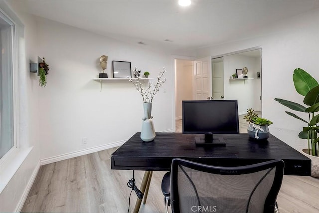 16592 Grimaud Ln, Huntington Beach, CA 92649 - office featuring wood finished floors and baseboards
