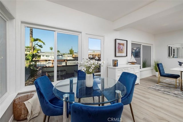 16592 Grimaud Ln, Huntington Beach, CA 92649 - dining space with light wood finished floors and baseboards