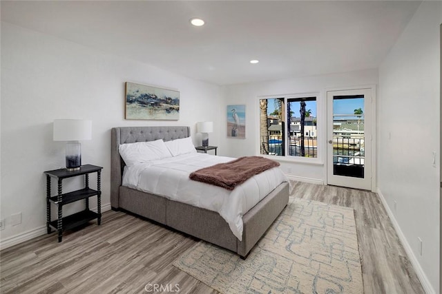 16592 Grimaud Ln, Huntington Beach, CA 92649 - bedroom with light wood finished floors, access to outside, baseboards, and recessed lighting
