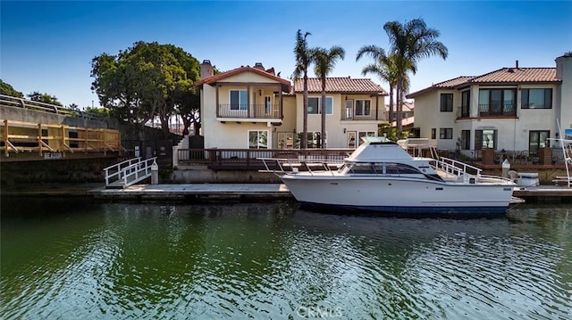 16592 Grimaud Ln, Huntington Beach, CA 92649 - dock area featuring a water view and a balcony