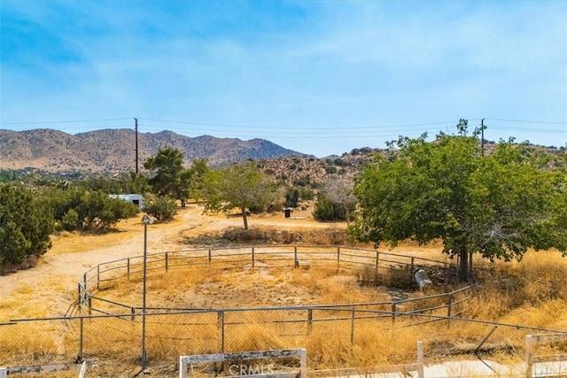 property view of mountains featuring a rural view