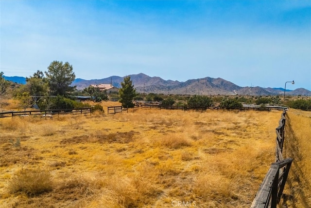 property view of mountains featuring a rural view