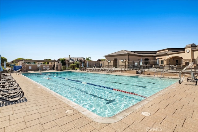 view of pool with a patio area