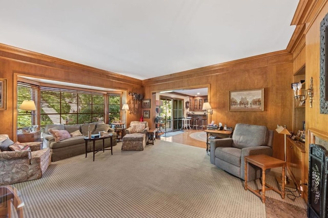 living room featuring crown molding and wood walls