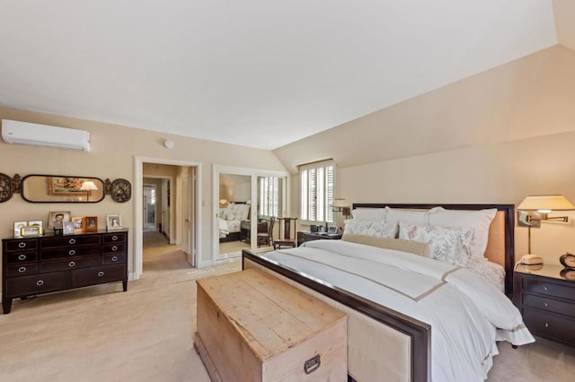 bedroom featuring light carpet, a wall unit AC, and lofted ceiling