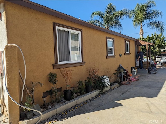 1620 E Mcmillan, Compton, CA 90221 - view of home's exterior featuring a patio area and stucco siding