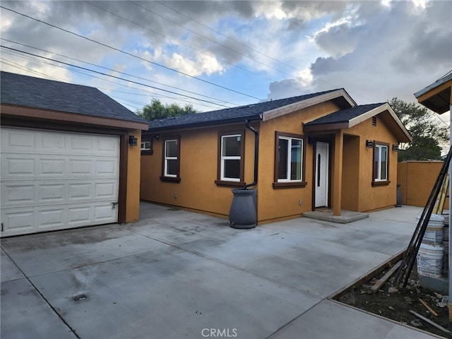 exterior space with a garage