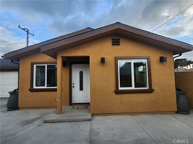 1620 E Mcmillan, Compton, CA 90221 - view of front of house featuring stucco siding and a patio