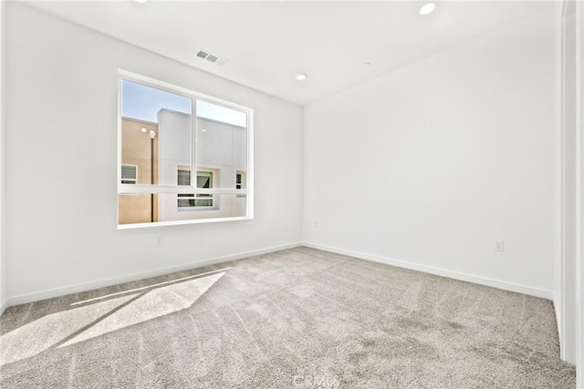 view of carpeted spare room