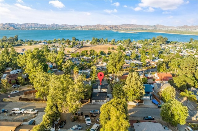 bird's eye view featuring a water and mountain view