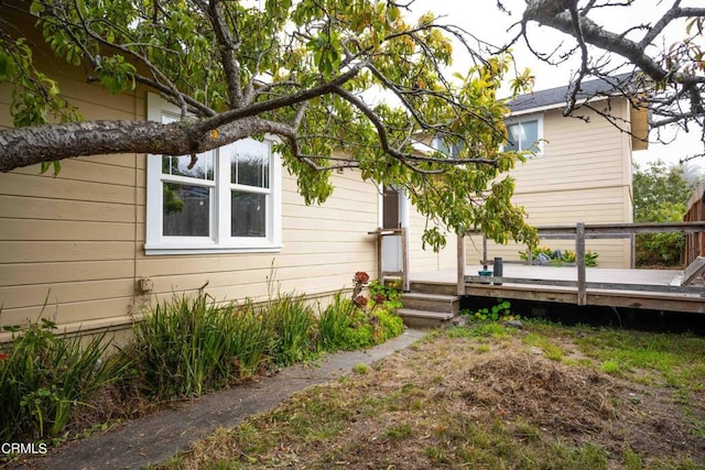 rear view of property with a deck