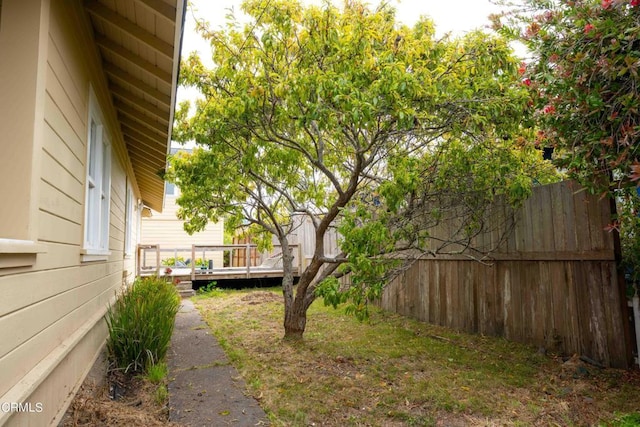 view of yard featuring a wooden deck