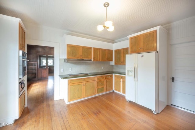 kitchen with tasteful backsplash, light hardwood / wood-style floors, oven, and white fridge with ice dispenser