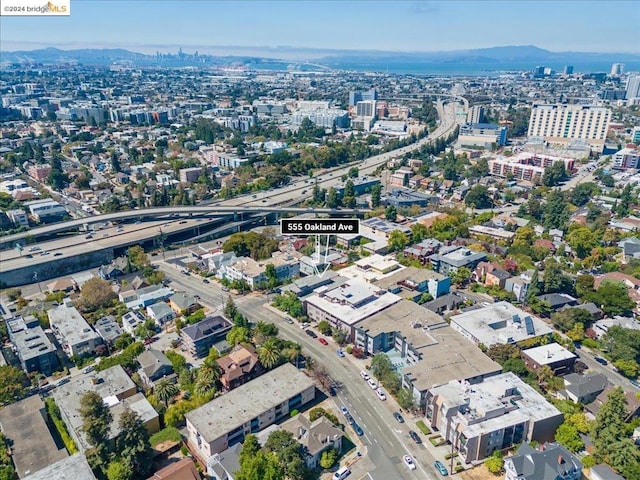 birds eye view of property featuring a mountain view