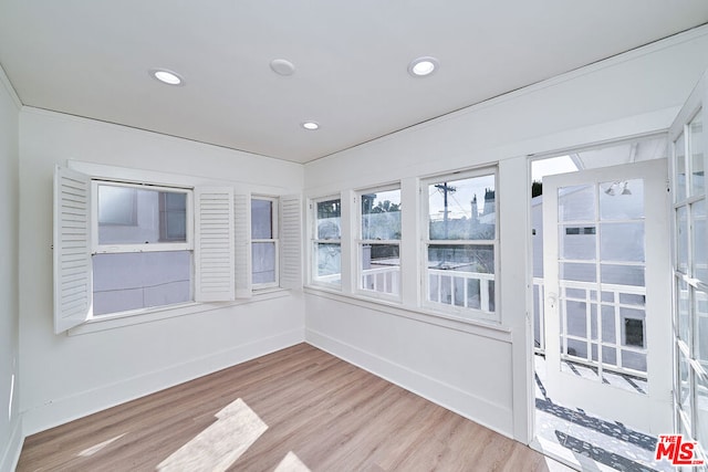 view of unfurnished sunroom