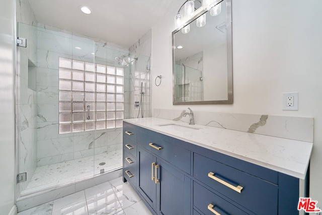 bathroom featuring vanity and walk in shower