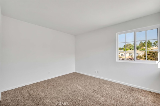 view of carpeted spare room