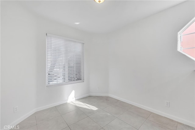 view of tiled spare room