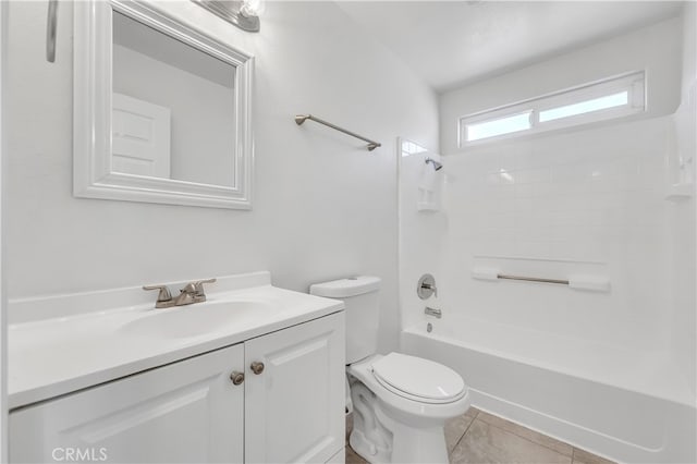 full bathroom featuring tile patterned flooring, vanity, toilet, and shower / washtub combination