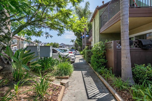 view of yard featuring a balcony