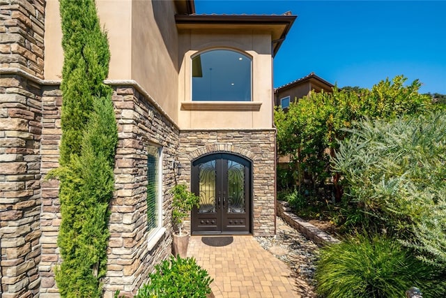 view of exterior entry with french doors