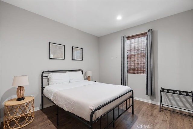 bedroom featuring hardwood / wood-style floors