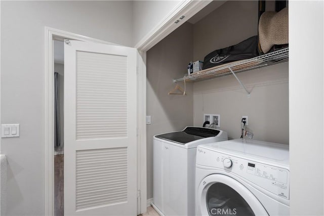 laundry area featuring washing machine and dryer