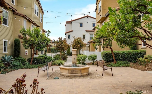 view of home's community with a patio