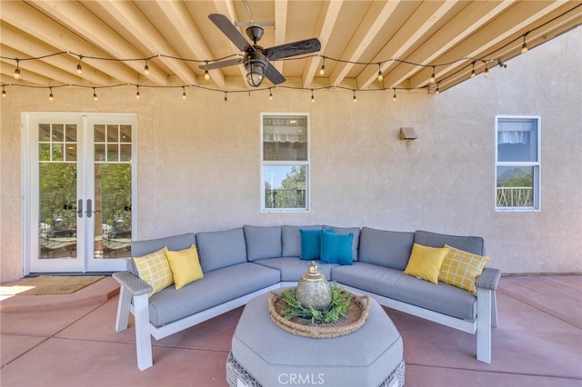 view of patio / terrace with ceiling fan and an outdoor living space