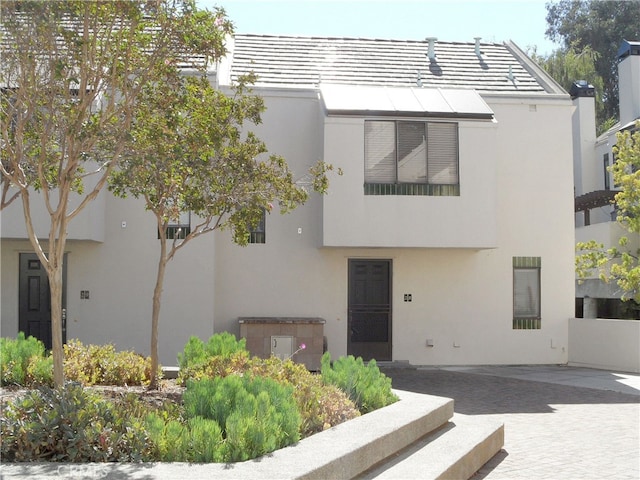 view of front of home with a patio area