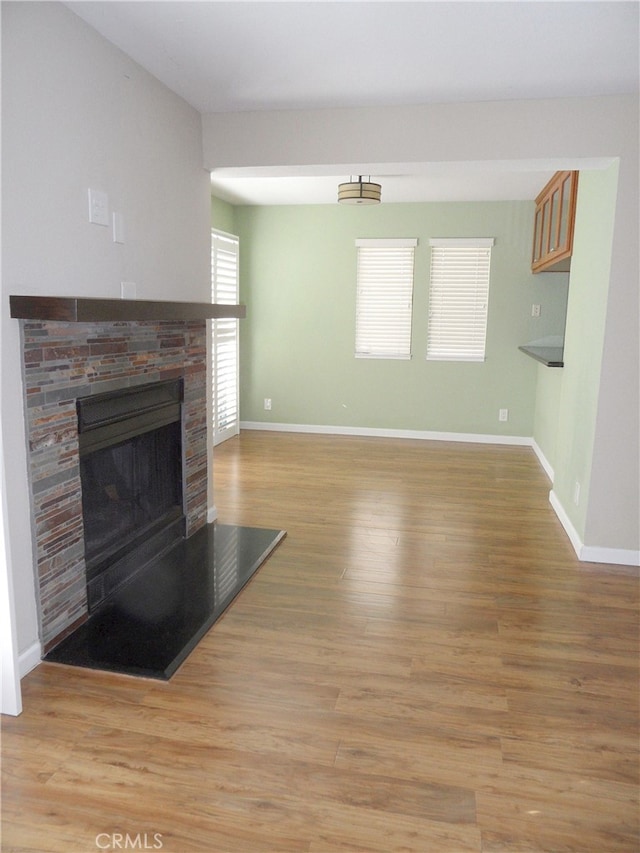 unfurnished living room featuring light hardwood / wood-style floors