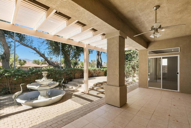 view of patio with a pergola and ceiling fan