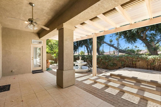 view of patio with ceiling fan and a pergola