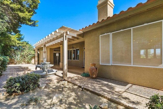 view of patio featuring a pergola