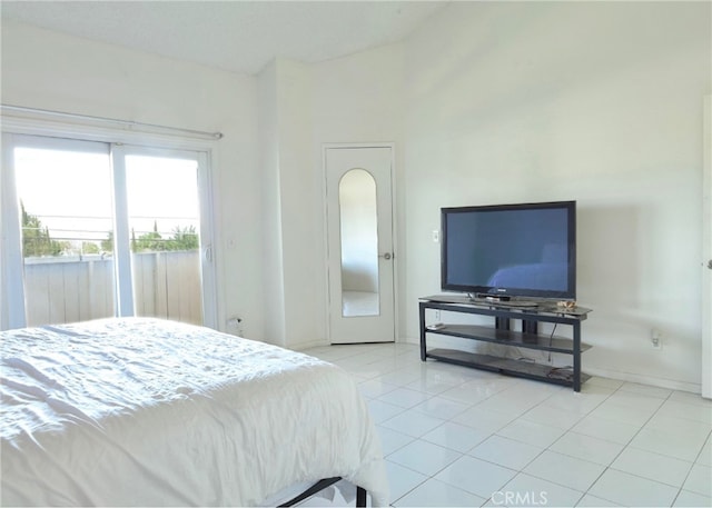 tiled bedroom with access to outside