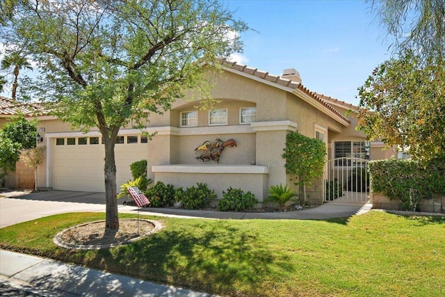 view of front facade featuring a front yard and a garage