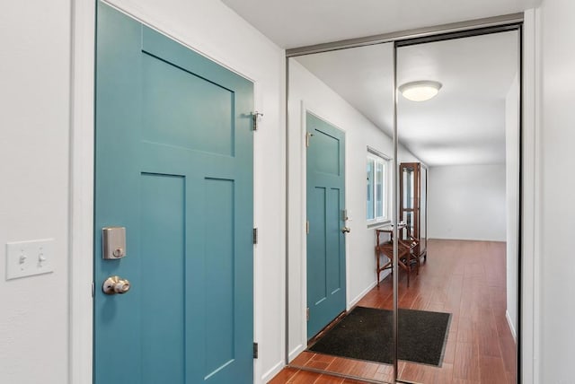 entrance foyer with hardwood / wood-style floors