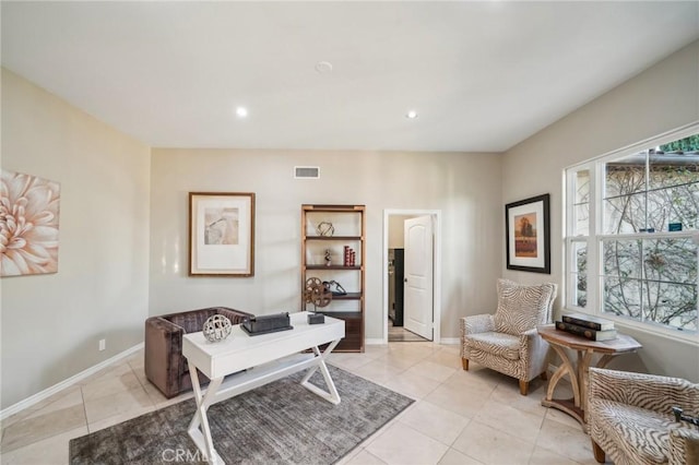 home office featuring light tile patterned flooring