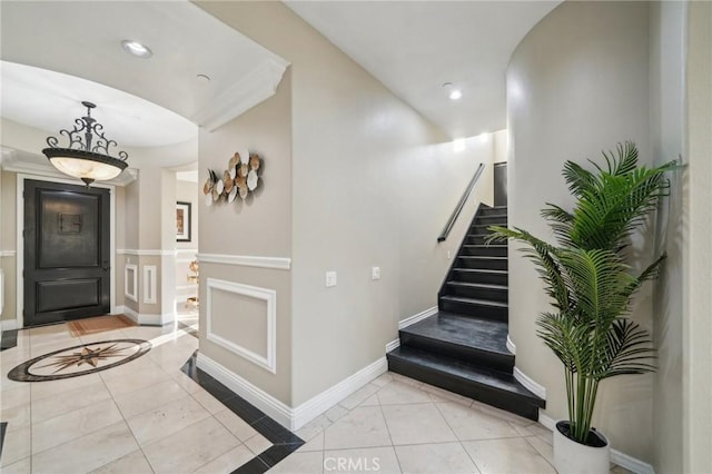 entryway featuring light tile patterned floors