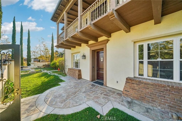 view of patio with a balcony