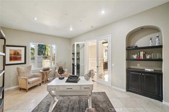 tiled office featuring french doors