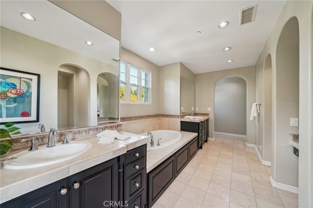 bathroom with vanity and tile patterned floors