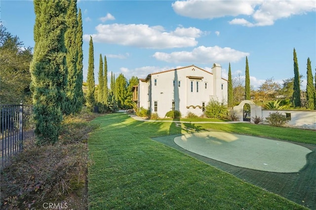 surrounding community featuring a yard